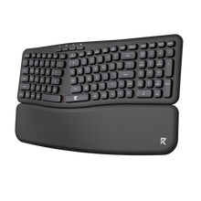 Black ergonomic keyboard with wrist rest on a black background
