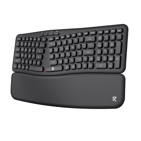 Black ergonomic keyboard with wrist rest on a black background