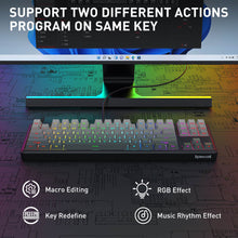 Keyboard with RGB effects on a computer setup, highlighting features like macro editing and music rhythm effect.