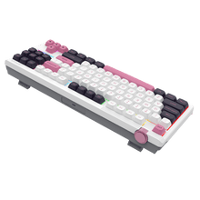 Mechanical keyboard with white frame and colorful keycaps on a black background
