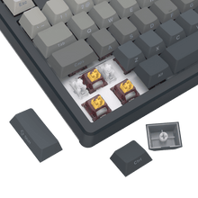 Close-up of a mechanical keyboard with keycaps on a black background