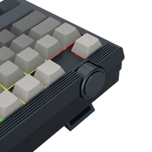 Close-up of a mechanical keyboard with gray keys and black frame on a transparent background