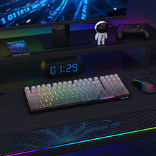 Gaming setup with keyboard, mouse, and monitor on a desk