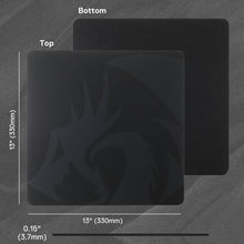 Black mouse pad with measurements on a gray background