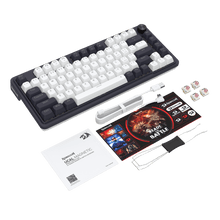 Mechanical keyboard kit with keycaps, wrist rest, and accessories on a black background